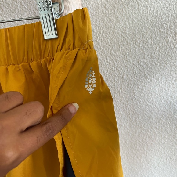 Free People Movement Run For It Mustard Yellow and Navy Shorts NWOT - Picture 7 of 10